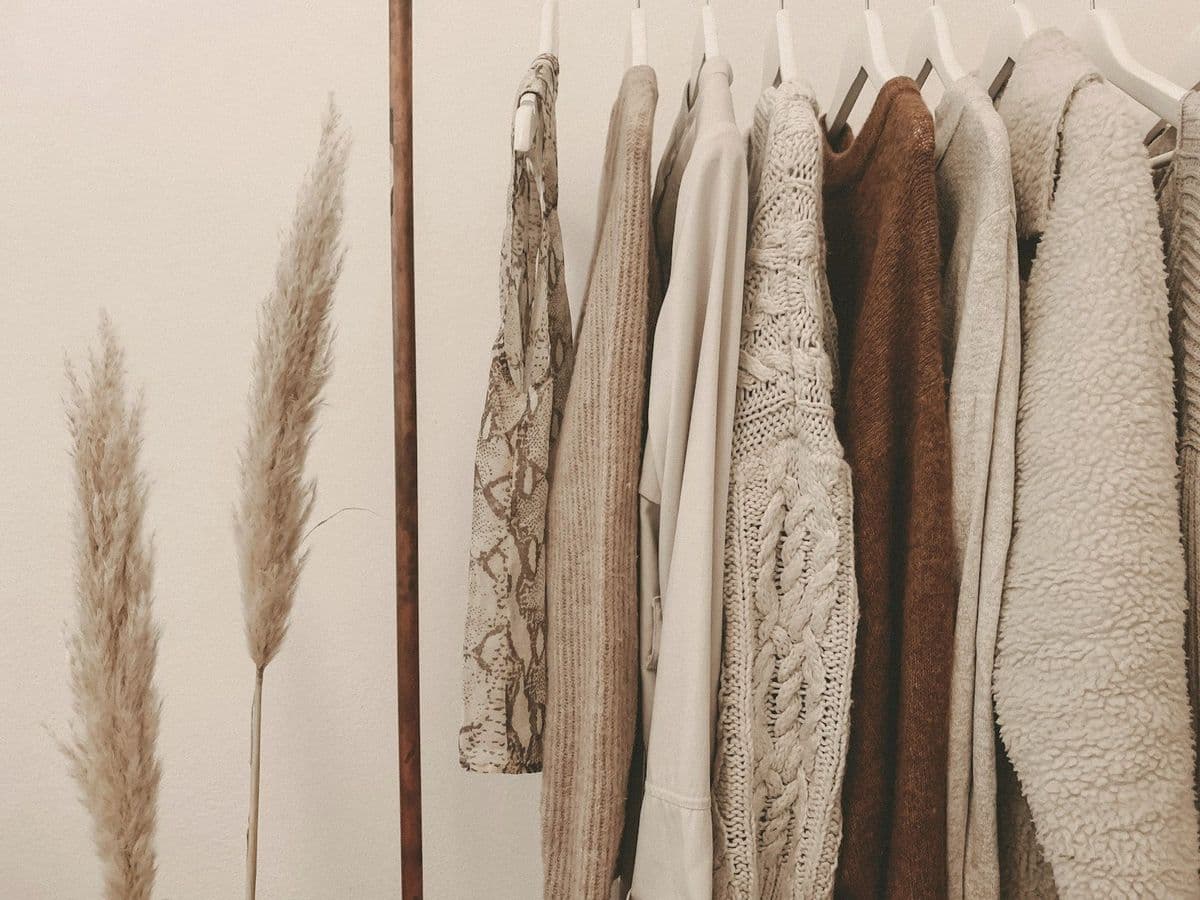 Knitwear hanging in warm light
